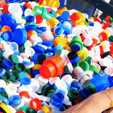 Gif of a hand moving plastic lids