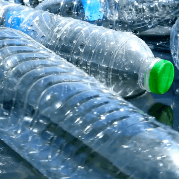 gif of plastic bottles floating in the ocean