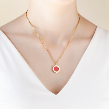 Jason Hyde sustainable red pendant necklace.