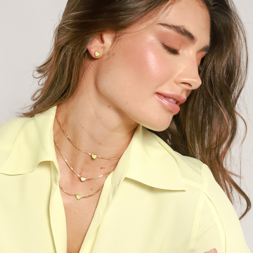 Sustainable Jason Hyde Amare collection: layered gold plated necklaces with heart charms