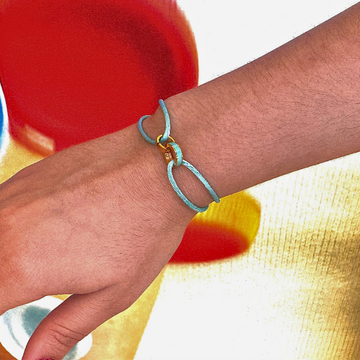 Jason Hyde turquoise cord bracelet with gold-tone and  turquoise knot