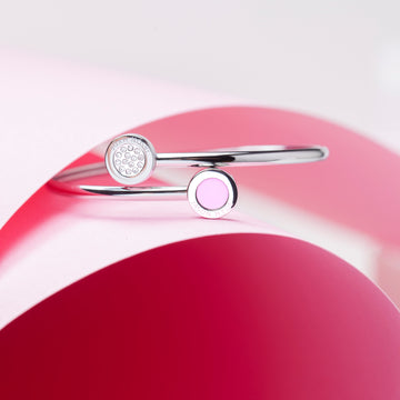 Silver bangle with pink enamel and zirconia accents