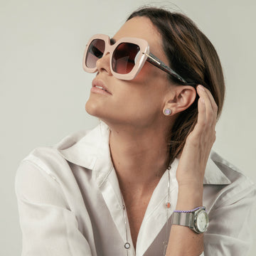 Woman modeling an Ocean Zirconia earring by Jason Hyde