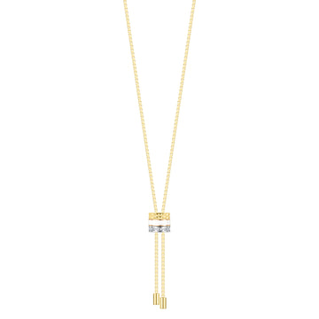 Gold necklace with a triple hoop pendant, perfect for a contemporary look.