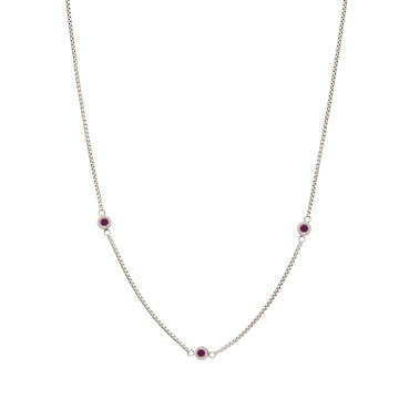 Silver  necklace with plum accents, perfect for adding a touch of color.
