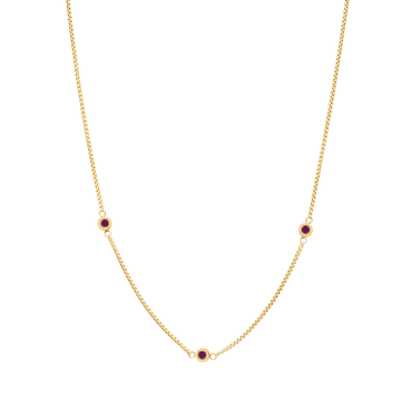 Gold necklace with plum accents on a white background.