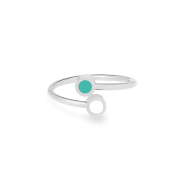 A chic silver ring with a spiral design and turquoise and white chips details