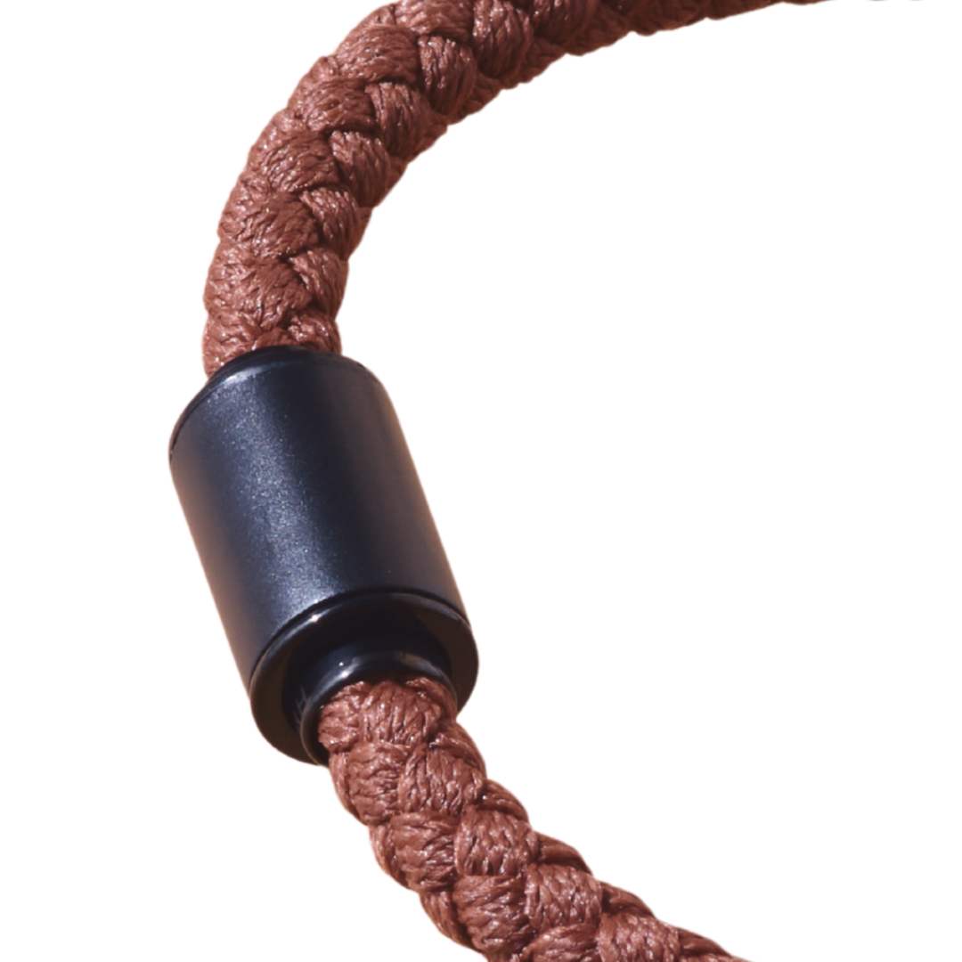 Brown braided cord bracelet on a white background.