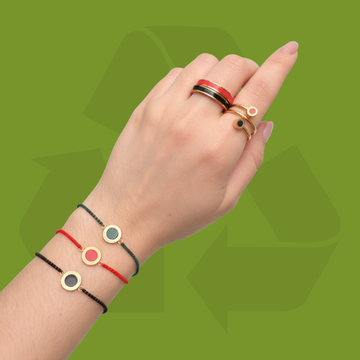 Hand wearing recycled jewelry