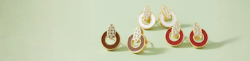 Collection of gold circular stud earrings with colorful enamel