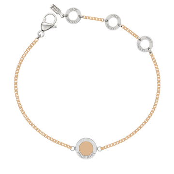 Beige chain bracelet with matching center disc.
