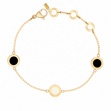 Gold box-chain bracelet featuring round black and cappuccino charms