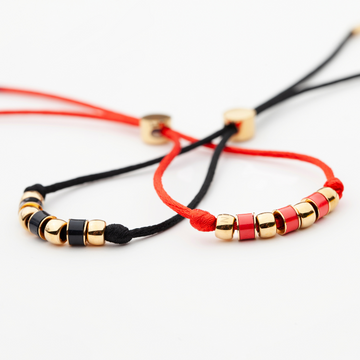 Luckymare bracelets in red and black