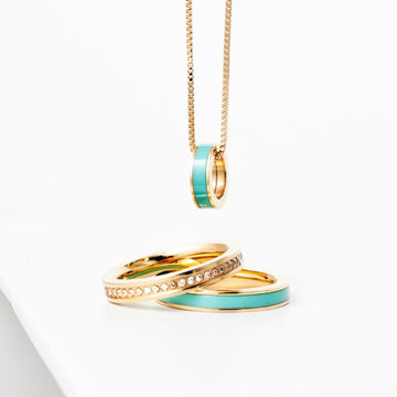  Gold plated zirconia ring, turquoise Wewa ring, and matching necklace.