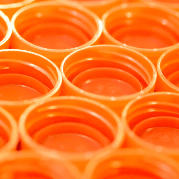 gif of orange plastic caps