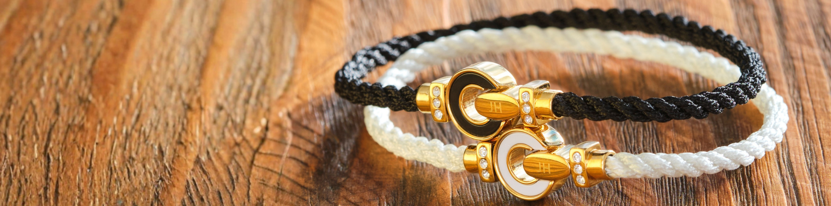 Jason Hyde sustainable bracelets: black and white twisted cord bands.