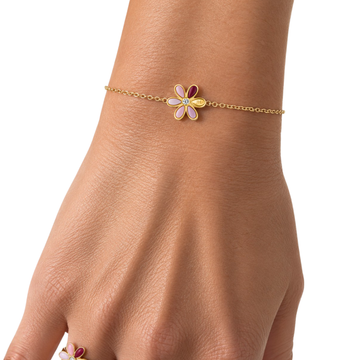 Gold-tone bracelet with burgundy flower enamel charm on slender chain