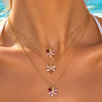 Burgundy flower chip pendant layered necklace with three gold chains