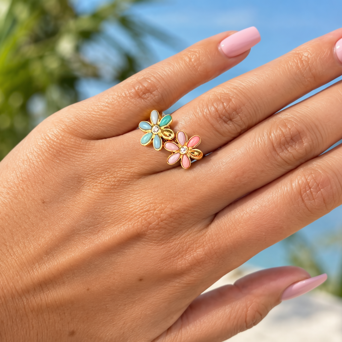 Coral chips floral ring with gold-tone band, pastel pink and teal flower details