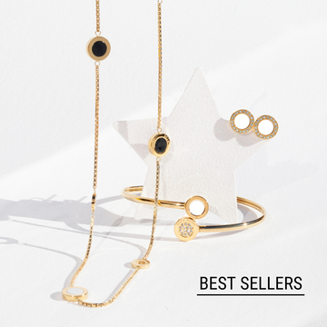 best sellers, bangle, necklace and earrings in black and white