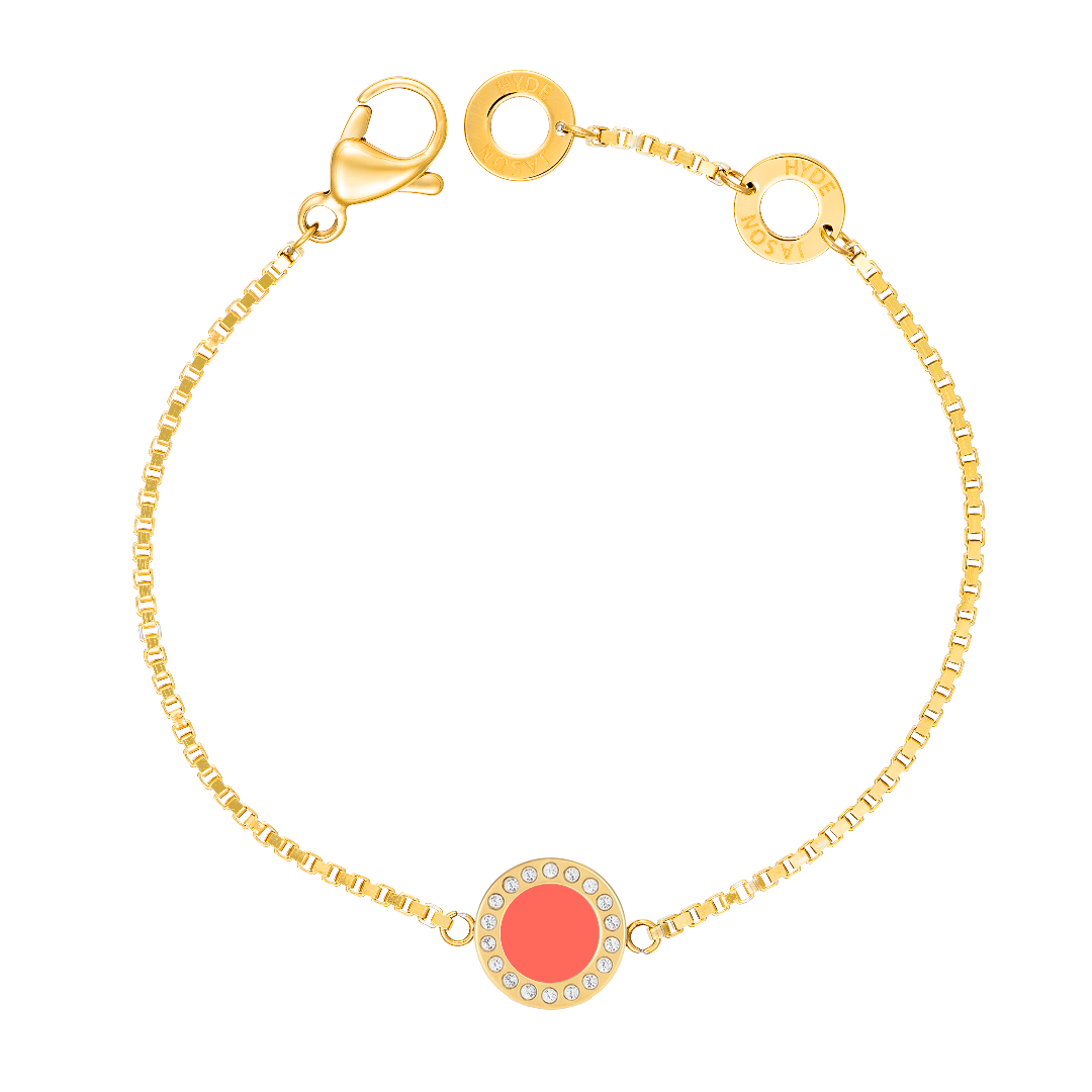 Gold-plated box chain bracelet with round coral enamel charm surrounded by zirconia stones by Jason Hyde