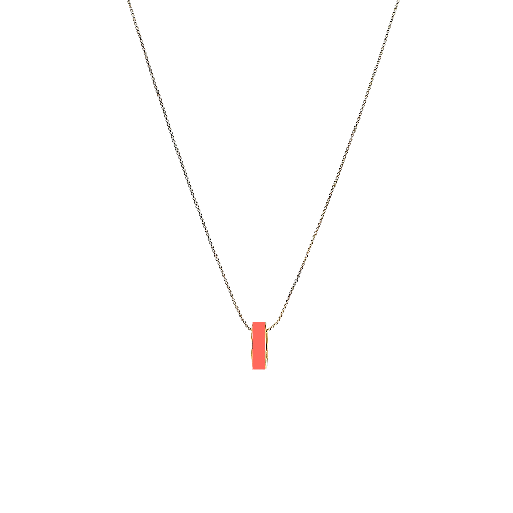 Gold-plated chain necklace with small coral enamel cylindrical pendant by Jason Hyde