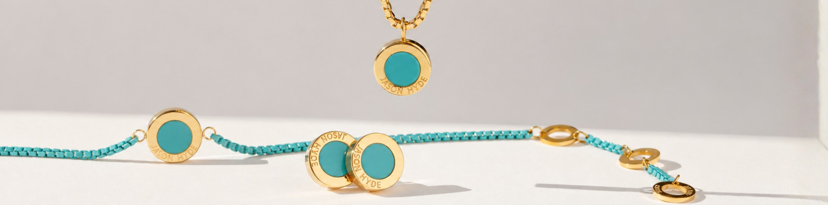 Jason Hyde gold and turquoise enamel round pendant necklace, matching bracelets, and stud earrings