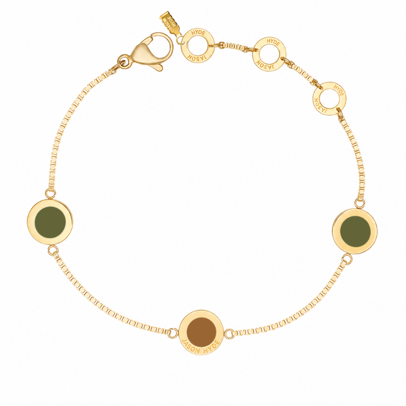 Gold box-chain bracelet featuring round olive green charm.