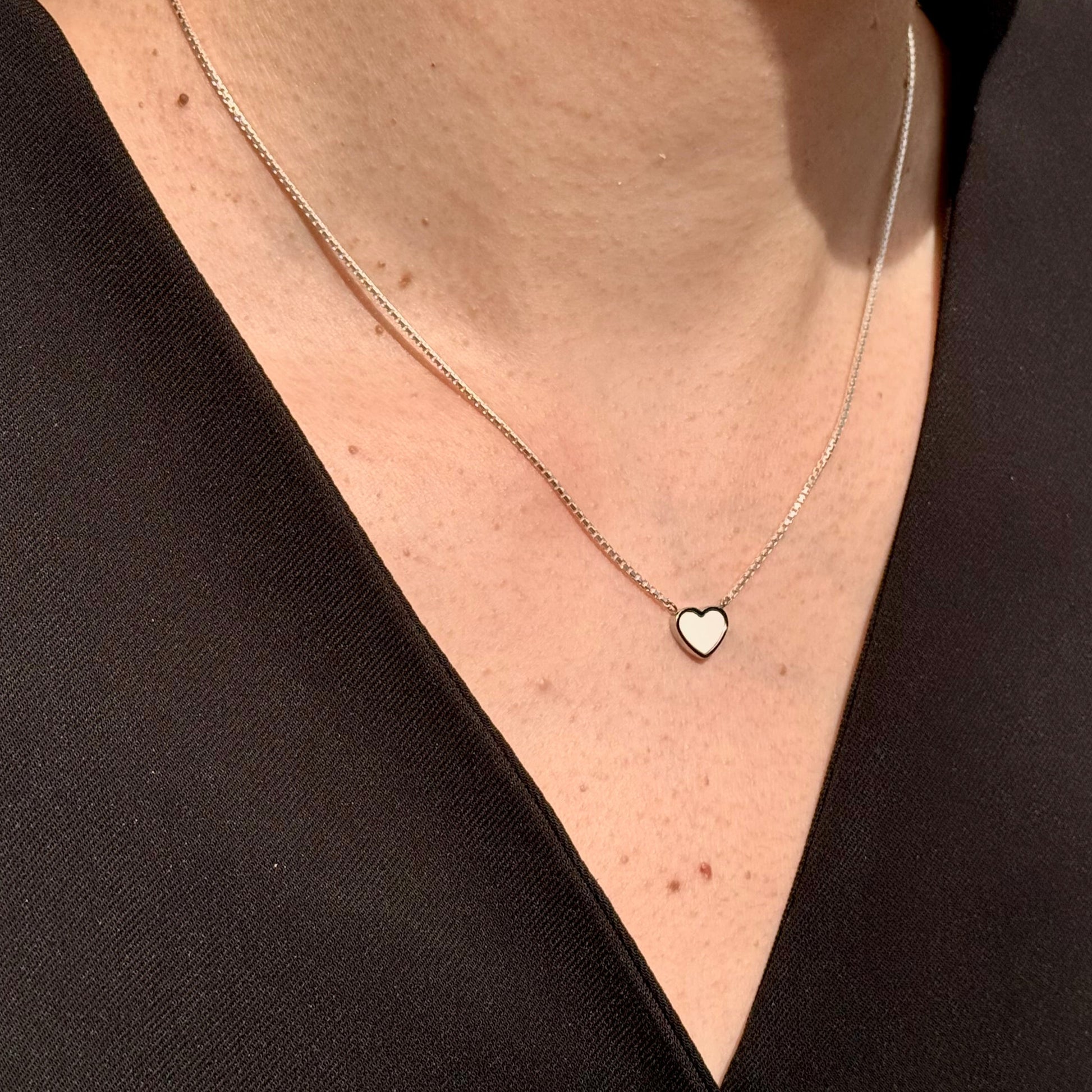 Jason Hyde Gold necklace with a white heart pendant