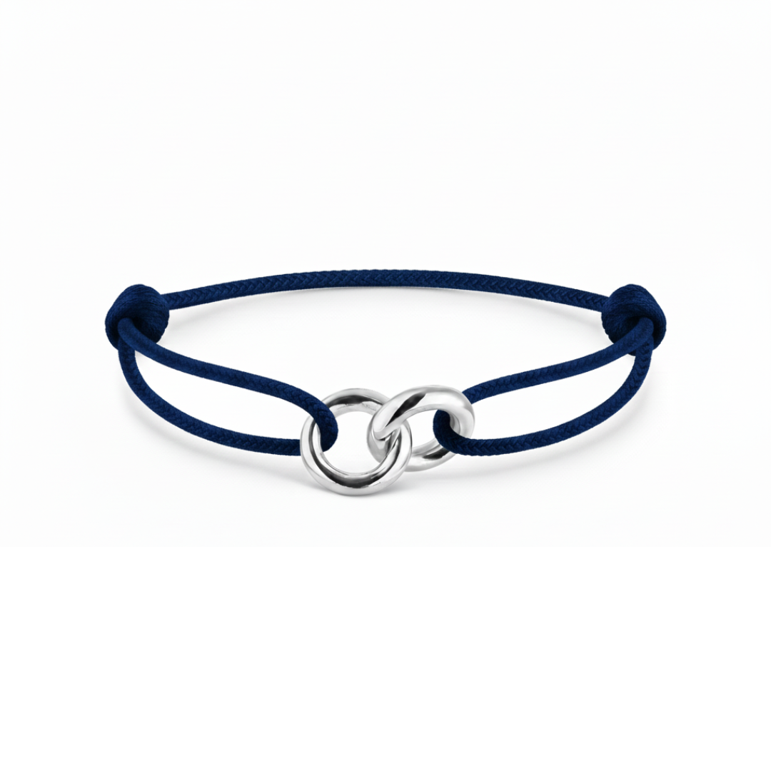 Sayna Cord bracelet with navy blue cord and interlocking silver charms