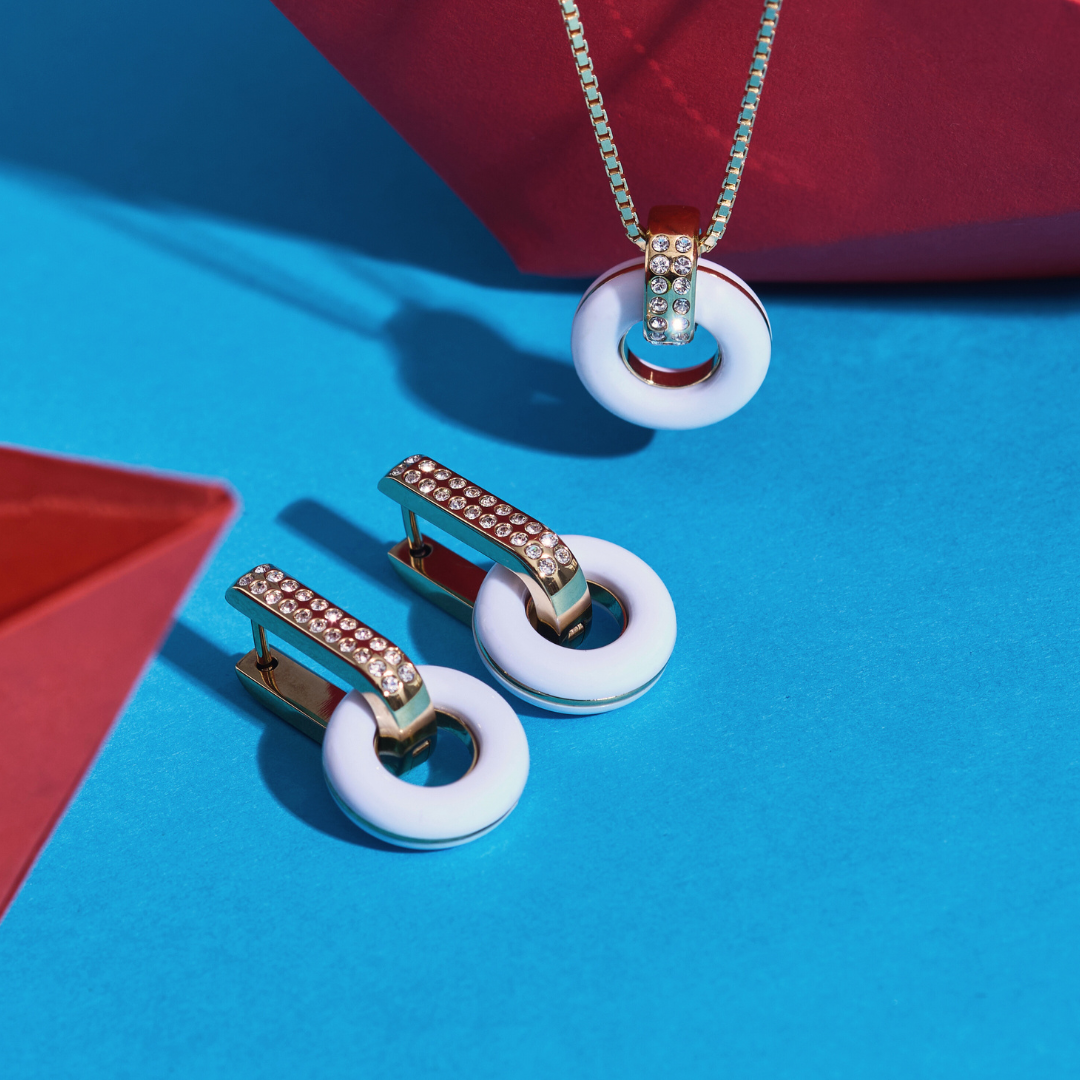 Lifesaver necklace and earring set featuring white circular pendants