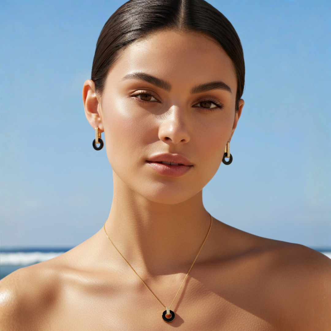Close-up of a beautiful woman modeling a gold-plated jewelry set