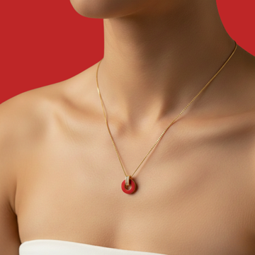 Close-up of a person wearing a Jason Hyde Lifesaver necklace