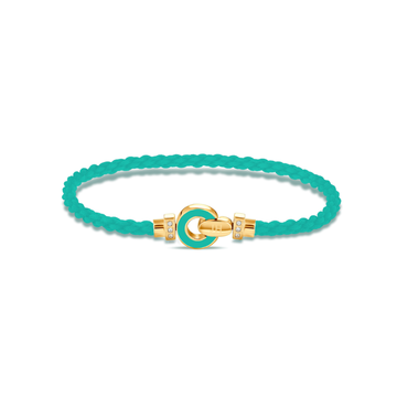Sustainable turquoise cord bracelet with gold accent and zirconia by Jason Hyde