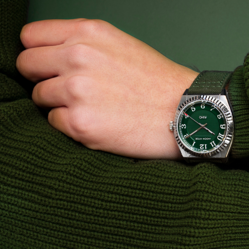 Stylish UNO 40mm watch featuring green dial and matching green strap