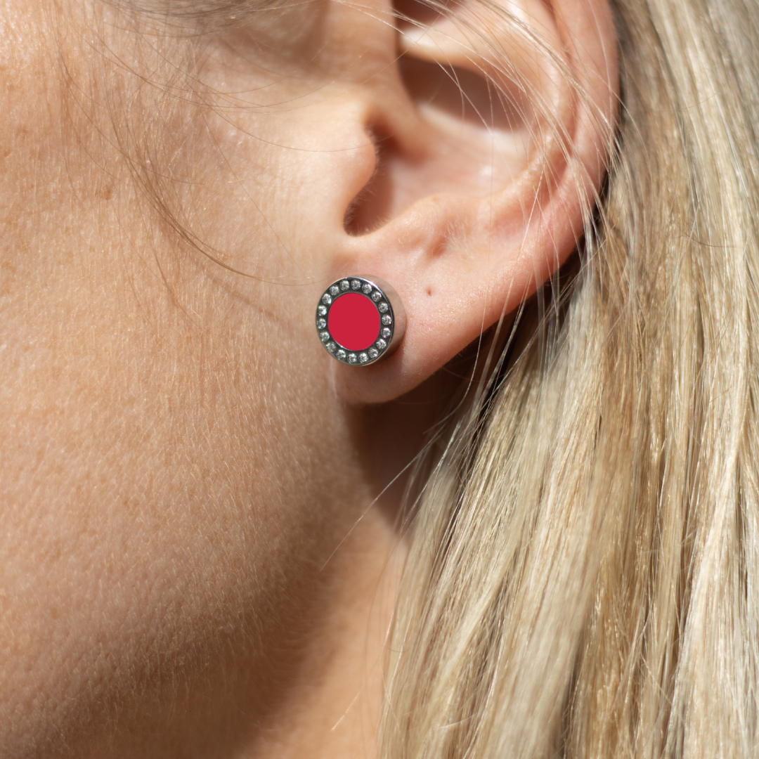Small red circular earring with zirconia by Jason Hyde