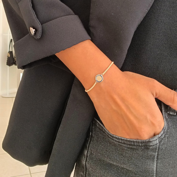 Jason Hyde women’s beige bracelet with round pendant charm, chic and versatile