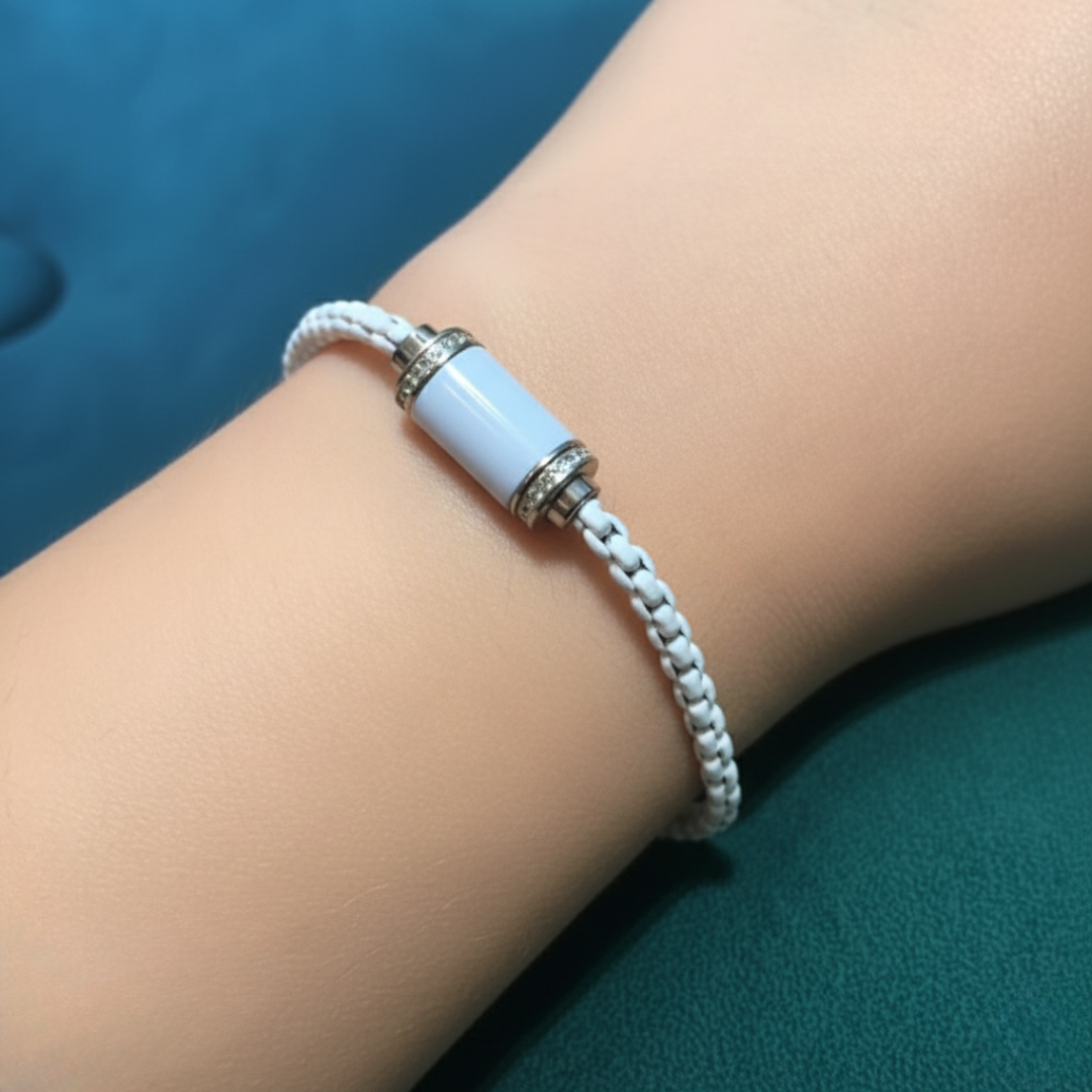 White Jason Hyde braided bracelet with white cylinder and zirconia accents