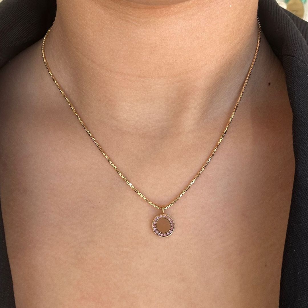 Jason Hyde gold-tone necklace with a nutshell pendant and a halo of small white stones