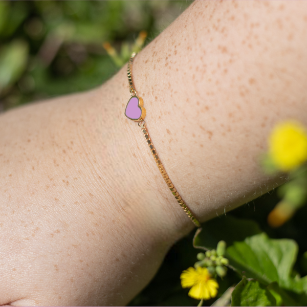 Women’s sustainable gold bracelet with fondant pink heart detail, Jason Hyde