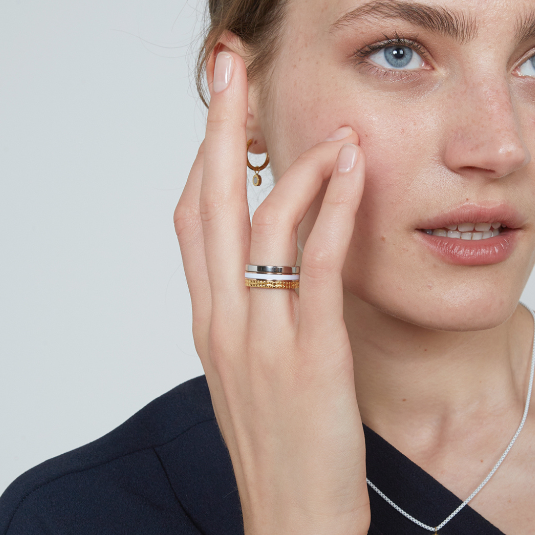 Woman wearing Jason Hyde mixed metal stacked rings
