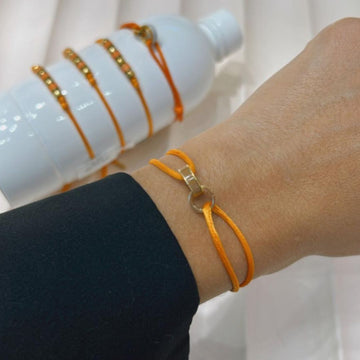 WEWA APRICOT CORD NUTSHELL CHIP BRACELET