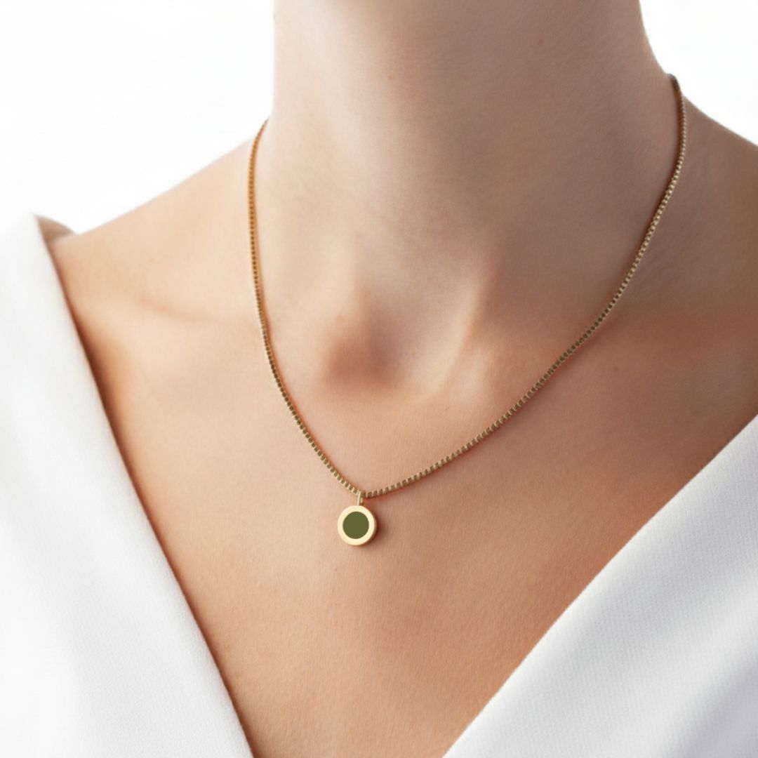 Jason Hyde olive green Ocean necklace on a model neck