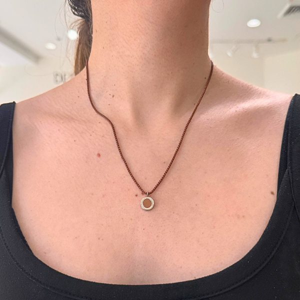 Minimalist circle pendant necklace on brown chain