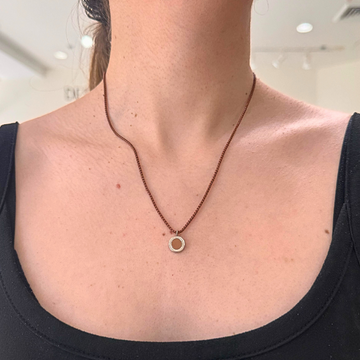 Minimalist circle pendant necklace on brown chain
