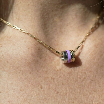 Gold paperclip chain necklace with a Lavender recycled plastic barrel pendant.