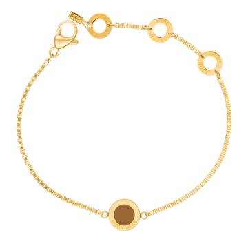 Nutshell circular charm on a gold box chain bracelet by Jason Hyde.