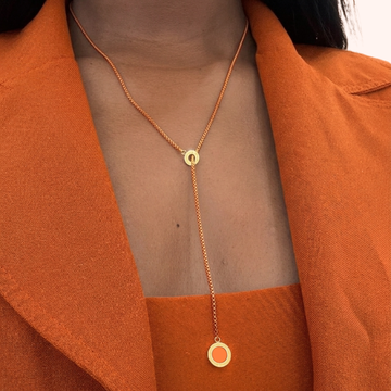 Lariat necklace in high quality gold plating on person