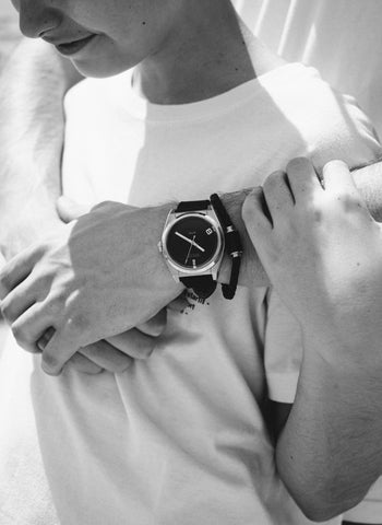 Dad and son, with watch and Thalassa bracelet on men's wrist