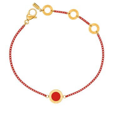 Red chain bracelet with a matching circular enamel charm
